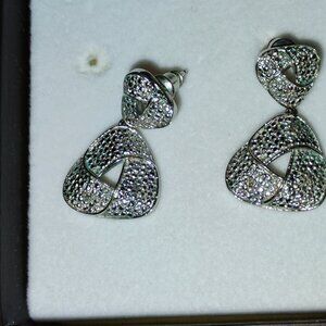 Sterling silver dangling earrings with diamond accents